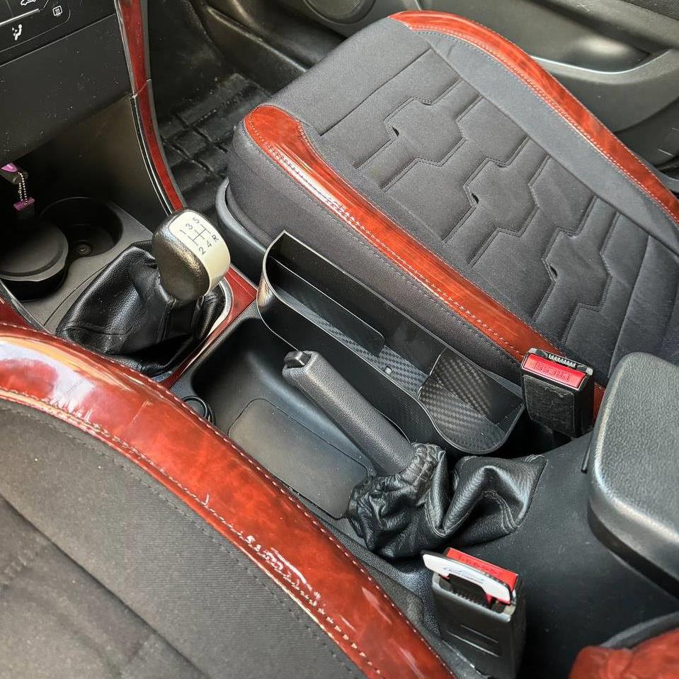 کنسول متحرک بین صندلی 1e6119d3-bd1e-4595-ad8b-22bb966f1c74.jpg